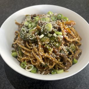 Stir fry steak and broccoli noodles