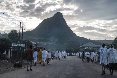 People walk to the church near the village of Tekeldengy, Northwest of Gondar, Ethiopia, on November 8, 2020. (Photo by EDUARDO SOTERAS / AFP)