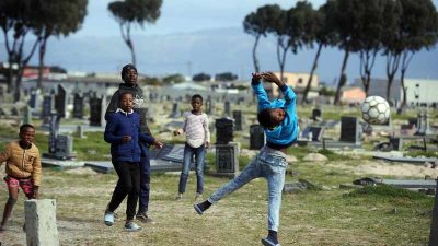 Children-from-Gugulethu-playing-soccer-in-NY5-cemetery-Picture-Ayanda-Ndamane-African-News-Agency-ANA