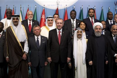 ISTANBUL, TURKEY - MAY 18: Turkish President Recep Tayyip Erdogan (C), Qatari Emir Sheikh Tamim bin Hamad al-Thani (L), Jordanian King Abdullah II (L2), President of Iran Hassan Rouhani (R2), Kuwaiti Emir Sheikh Sabah Al-Ahmad Al-Jaber Al-Sabah (R3) pose for a family photo during the Organization of Islamic Cooperation (OIC) Extraordinary Islamic Summit Conference at Istanbul Congress Center in Istanbul, Turkey on May 18, 2018. 
 ( Arif Hüdaverdi Yaman - Anadolu Agency )