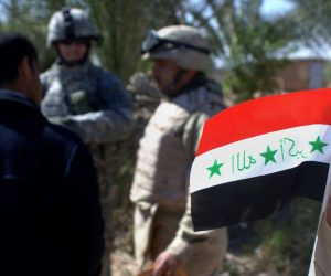 an-iraqi-flag-adorns-an-iraqi-soldiers-uniform-as-a-us-army-soldier-and-his-4ae276 an-iraqi-flag-adorns-an-iraqi-soldiers-uniform-as-a-us-army-soldier-and-his-4ae276